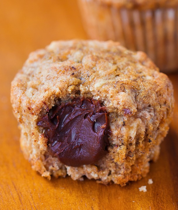 Banana Bread Nutella Muffins – soft and fluffy banana bread muffins... with a secret Nutella filling… http://chocolatecoveredkatie.com/2015/11/05/nutella-muffins/ from @choccoveredkt