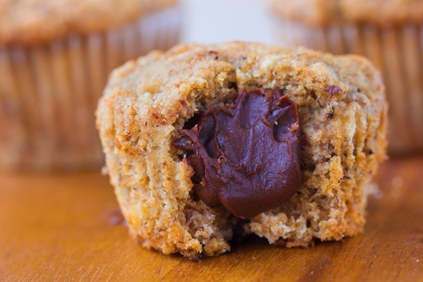 Banana Bread Nutella Muffins – soft and fluffy banana bread muffins... w/ a secret Nutella filling… http://chocolatecoveredkatie.com/2015/11/05/nutella-muffins/ from @choccoveredkt