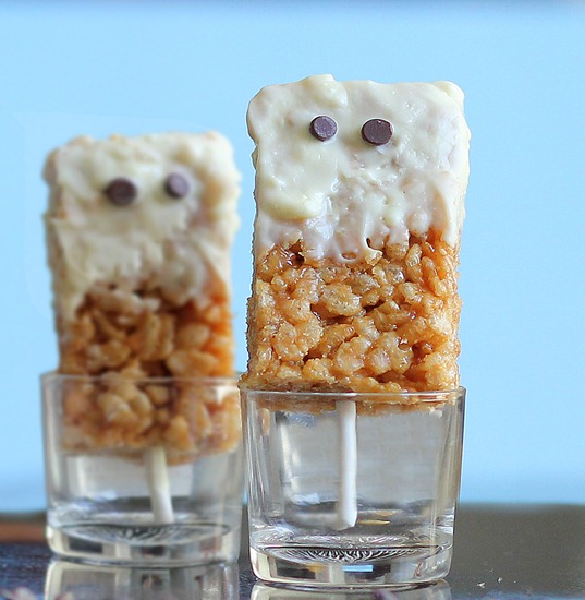 Spooky Peanut Butter Rice Krispy Treats -   NO corn syrup or sugar-filled marshmallows... healthier take on the classic childhood snack... @choccoveredkt... It is a not-so-scary Halloween treat you can feel GOOD about making for your whole family! http://chocolatecoveredkatie.com/2012/10/21/spooky-peanut-butter-rice-krispy-treats/