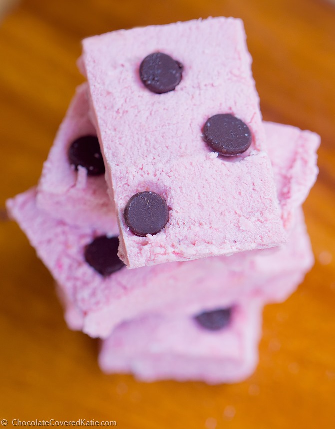 NO BAKE COCONUT KISS CANDY BARS - 5 ingredients / sugar-free / soy-free / dairy-free / gluten-free! Full recipe: http://chocolatecoveredkatie.com/2015/03/01/pink-coconut-kiss-candy-bars/